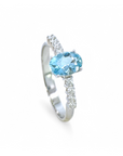 Anillo Solitario Topacio azul oval y brillantes