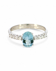 Anillo Solitario Topacio azul oval y brillantes