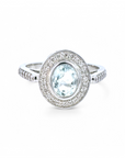 Anillo Solitario Aguamarina Oval 1 Ct en bisel y halo de brillantes