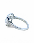 Anillo Solitario Aguamarina Oval 1 Ct en bisel y halo de brillantes