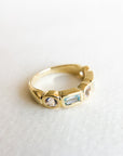 A pedido - Anillo Cintillo Morganitas y Topacios Bisel