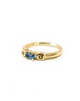 A pedido - Anillo Tricillo Topacio Azul Navette Grifa y Zafiro Amarillo Bisel