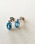 A pedido - Aros Stud Topacio Oval y diamantes Platino