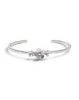 Esclava abierta de plata Sophia Schneider Joyas con diseño de flores, ajustable y acabado texturizado