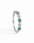 Anillo cintillo Sophia Schneider Joyas de plata 925 con esmeraldas verdes y diamantes en corte brillante