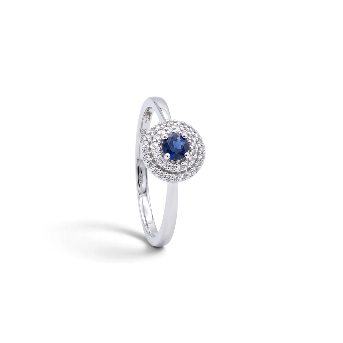 Anillo solitario Sophia Schneider Joyas de plata 925 con zafiro central y halo de diamantes corte brillante