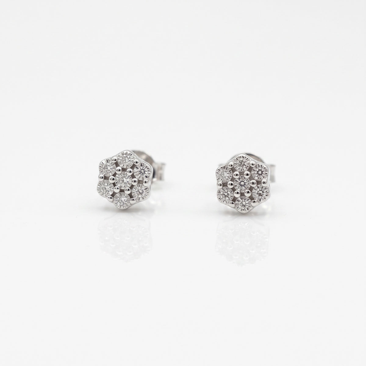 Aros stud diamantes 0,05 ct Flor mini plata