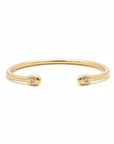 Esclava abierta tubular oro 18K diamantes en bisel