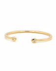Esclava abierta tubular oro 18K diamantes en bisel