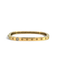 Esclava rectangular de Sophia Schneider Joyas en oro 18K con cinco diamantes brillantes incrustados