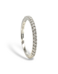 Anillo cintillo diamantes en grifa 0,25 ct oro blanco 10K