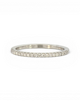 Anillo cintillo diamantes en grifa 0,17 ct oro 14K