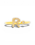Anillo diseño letra R brillantes oro 18K