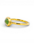 Anillo solitario turmalina verde oval en bisel oro 18K