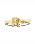 Anillo diseño letra R brillantes oro 18K