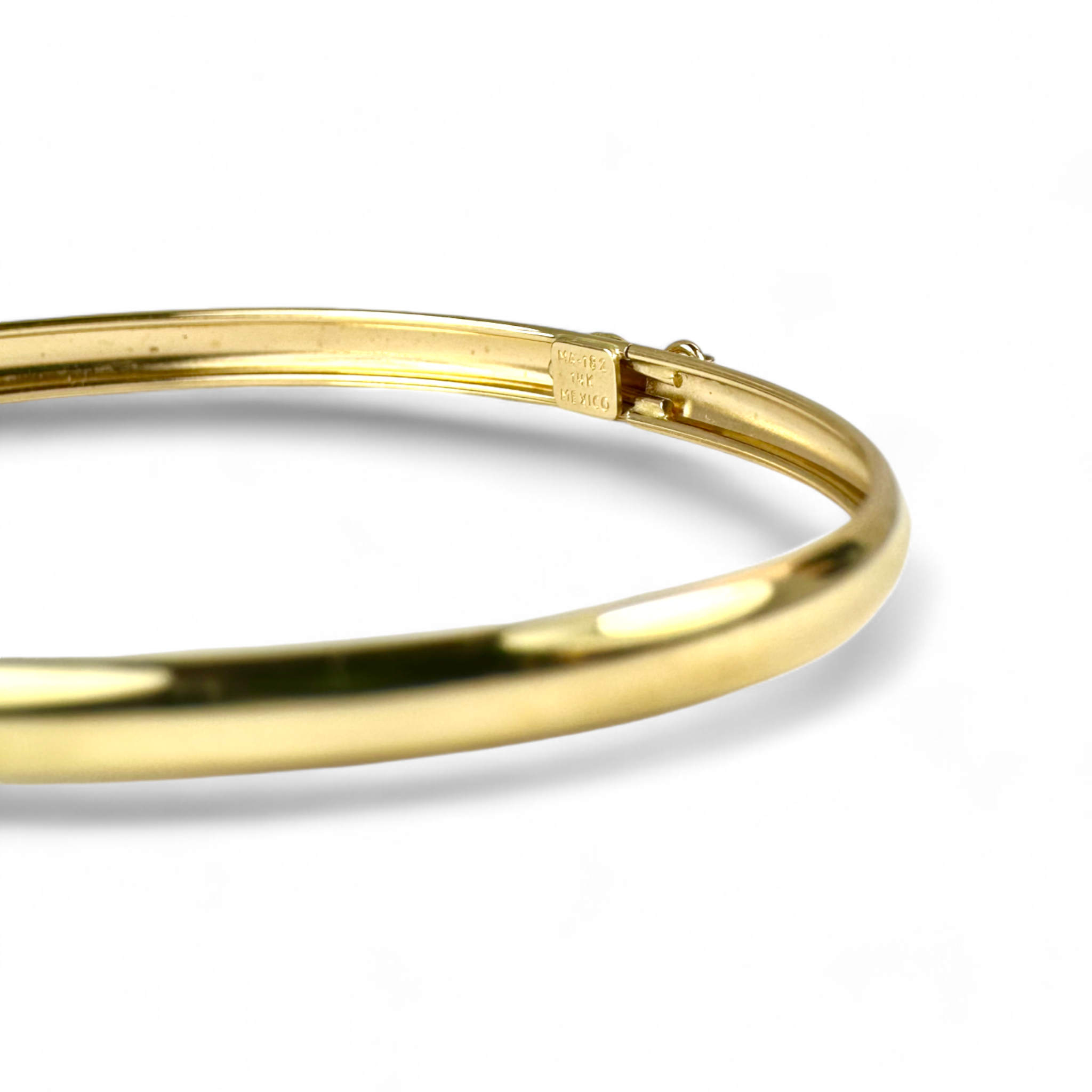 Pulsera esclava oval oro 14K semiflexible broche seguridad