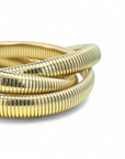 Pulseras triples de bronce doradas