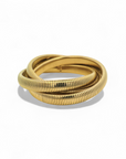 Pulseras triples de bronce doradas