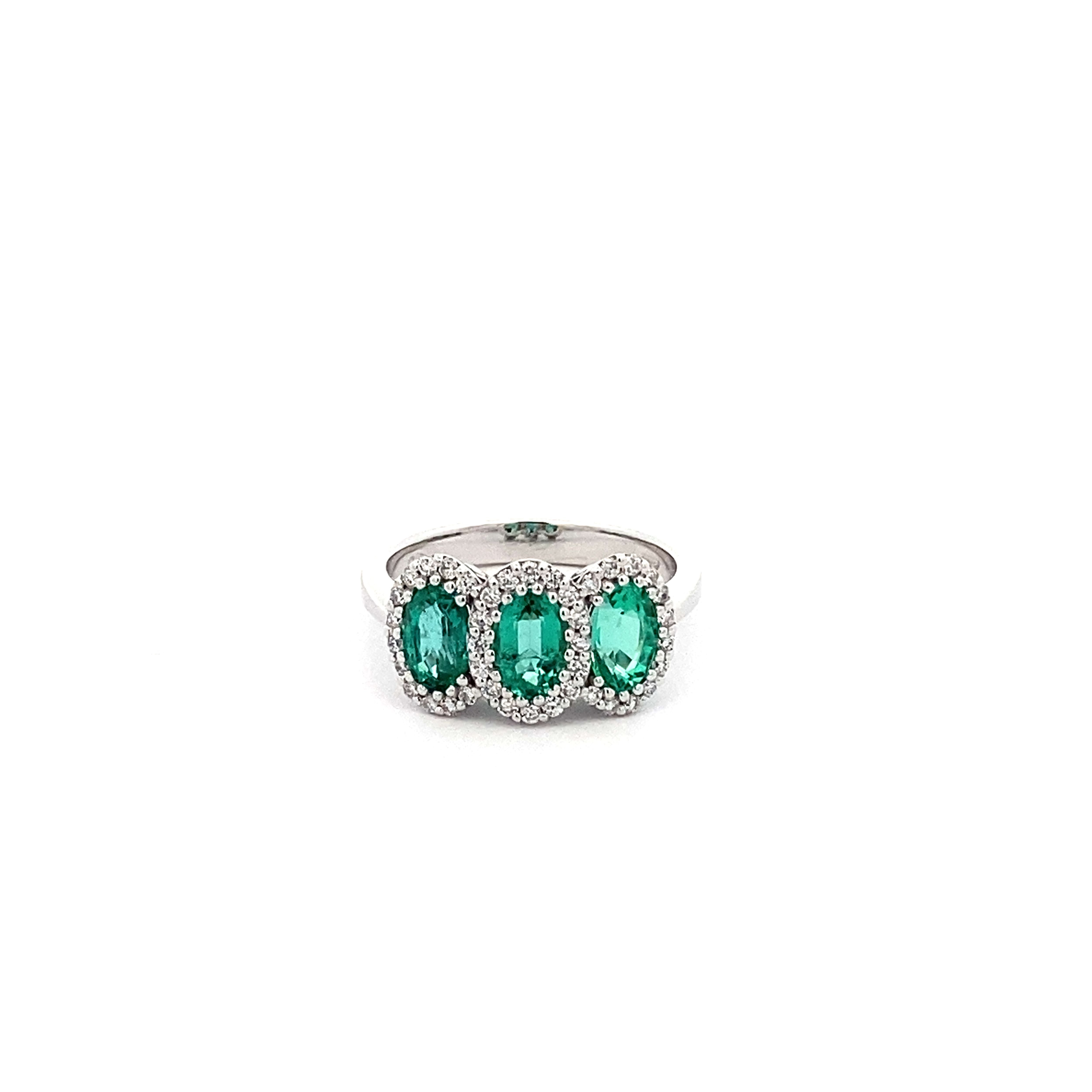 Anillo Tricillo Esmeralda Oval 1,8 Ct con halo de diamantes