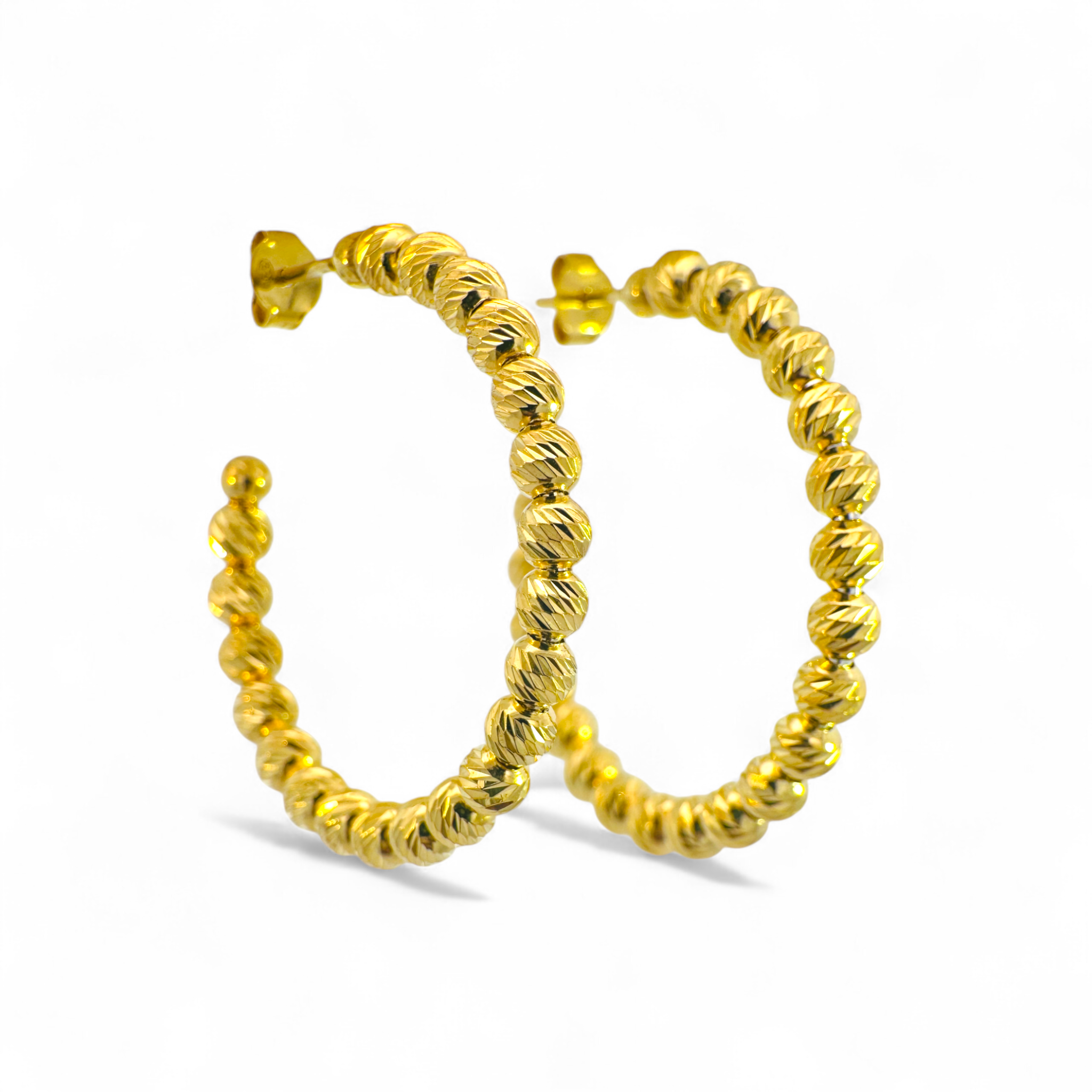Aros argollas facetadas de plata 925 bañados en oro