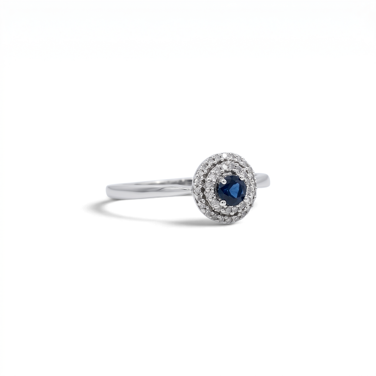 Anillo solitario Sophia Schneider Joyas de plata 925 con zafiro central y halo de diamantes corte brillante