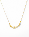 Collar Ala y bolitas facetadas oro 18K
