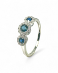 Anillo Tricillo de Zafiro con halo de diamantes