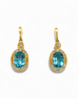 Aros colgantes topacio azul oval con brillantes oro 14K