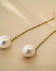 Aros colgantes cadena oro 18K y perla oval