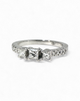 Anillo Tricillo Diamantes Princess central 0,22 Ct en Platino hecho a mano