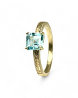 Anillo Solitario Topacio Azul Grifa argolla diseño Gold