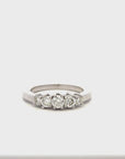 Anillo Quintillo Diamante central 0,25 ct en platino Hecho a mano