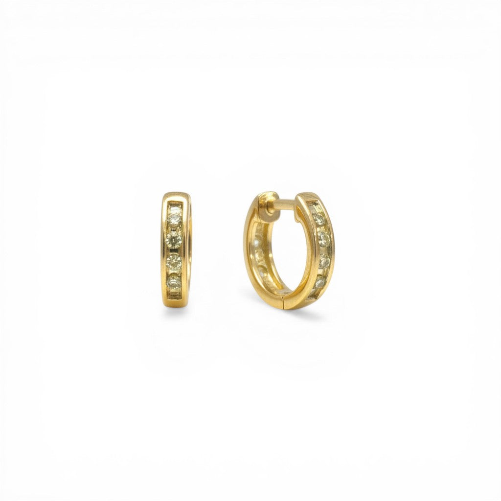 Sophia Schneider Joyas 10K gold hoop earrings with channel-set diamonds, 10mm diameter, 0.05 ct total diamond weight.