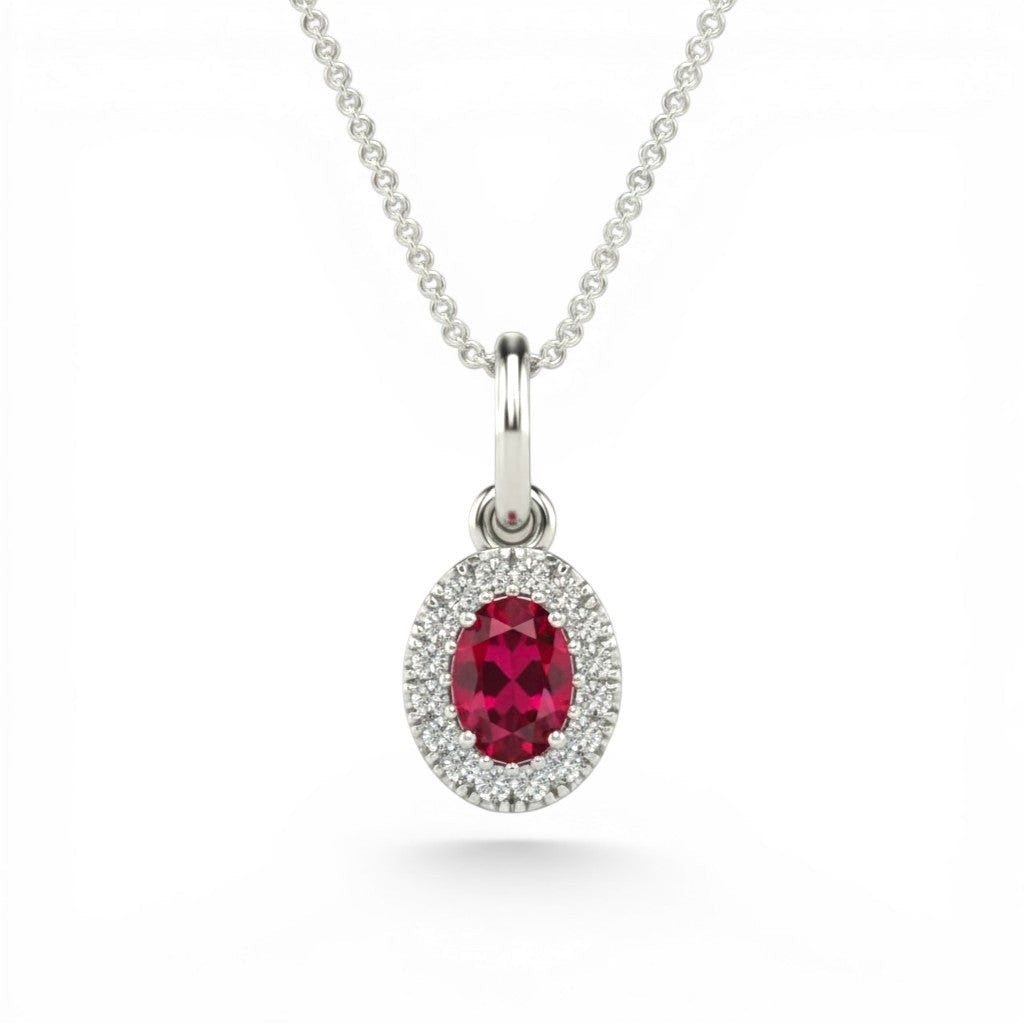 Sophia Schneider Joyas 14K white gold necklace with oval ruby halo diamond pendant.