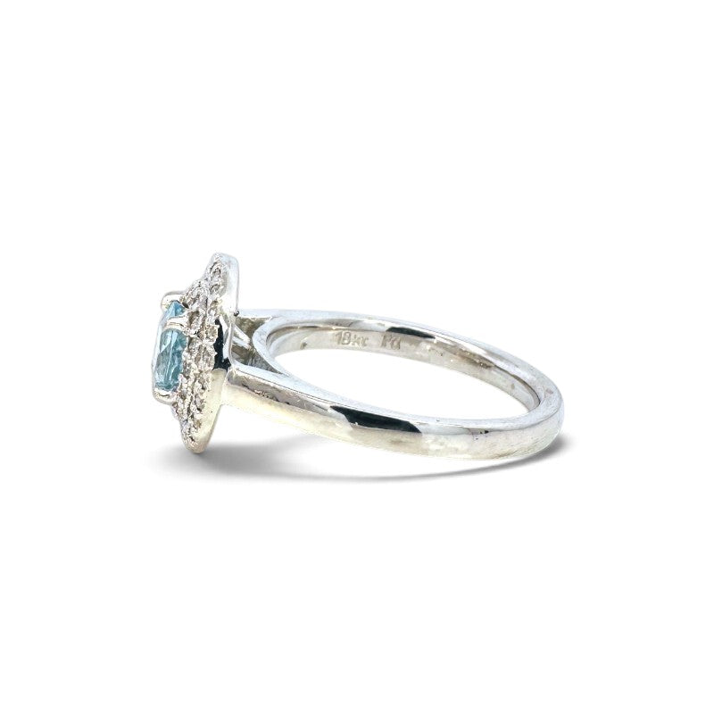 Anillo solitario Sophia Schneider Joyas de oro blanco 18K con aguamarina redonda y doble halo de diamantes vista lateral