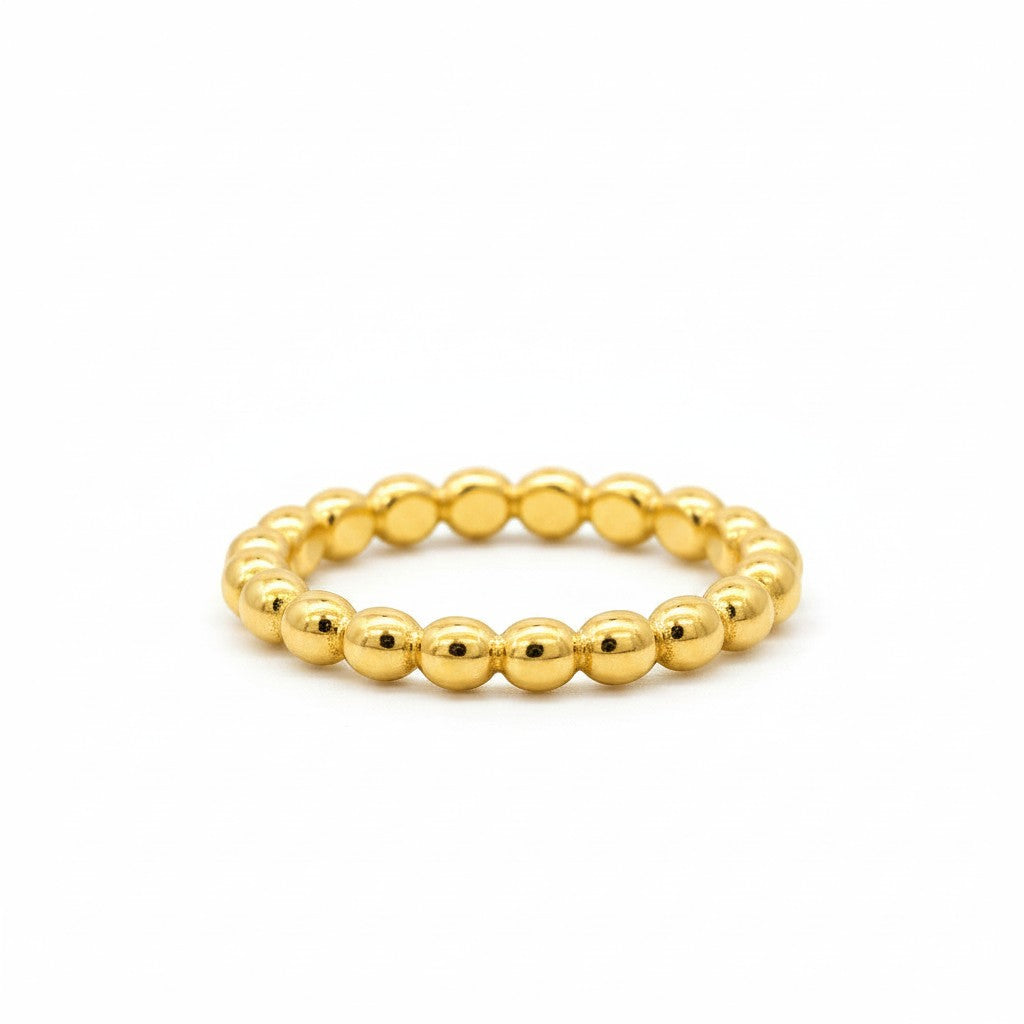 Anillo tipo argolla con diseño de bolitas planas en plata 925 con baño de oro 18K de Sophia Schneider Joyas