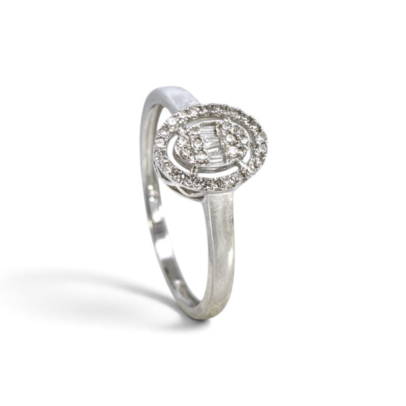 Anillo solitario Sophia Schneider Joyas en oro blanco 10K con diamantes corte baguette y halo de brillantes 0,20 ct