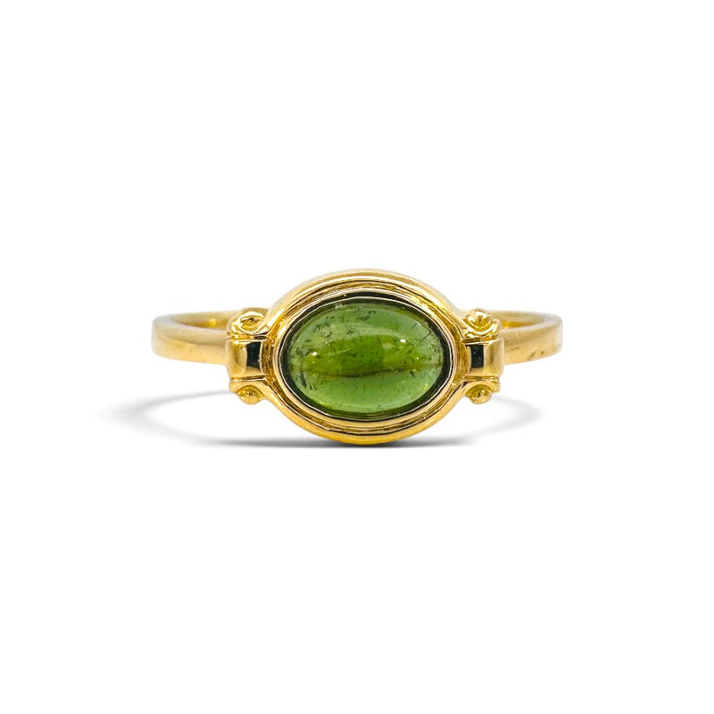 Anillo solitario Sophia Schneider Joyas de oro 18K con turmalina verde ovalada en engaste de bisel elegante.