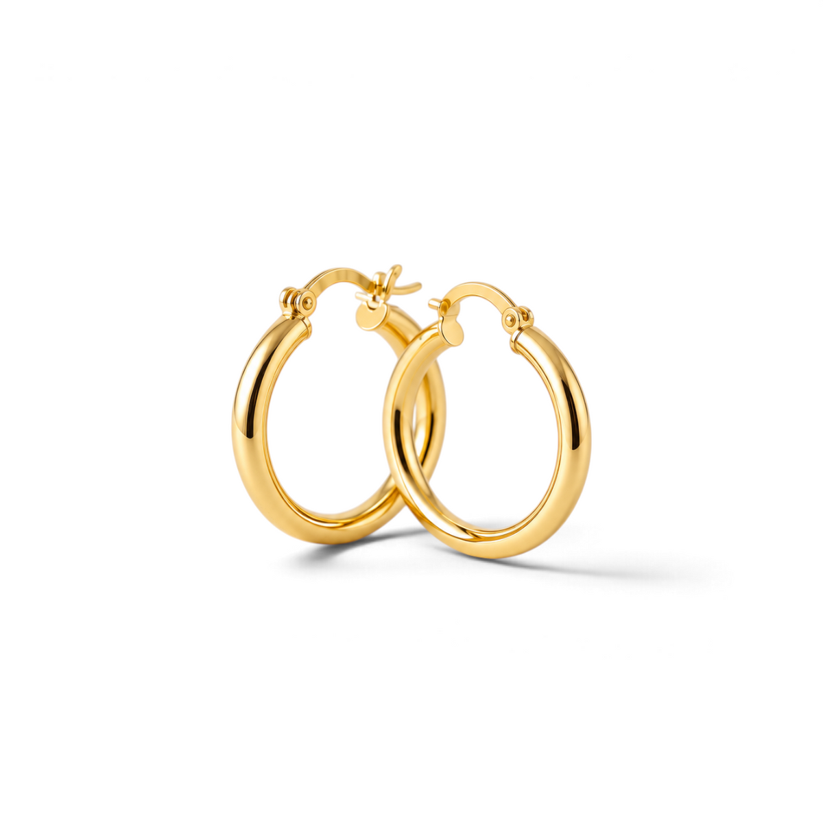 Aros argollas tubulares de 25 mm en oro amarillo 18K de Sophia Schneider Joyas con acabado brillante y cierre seguro.