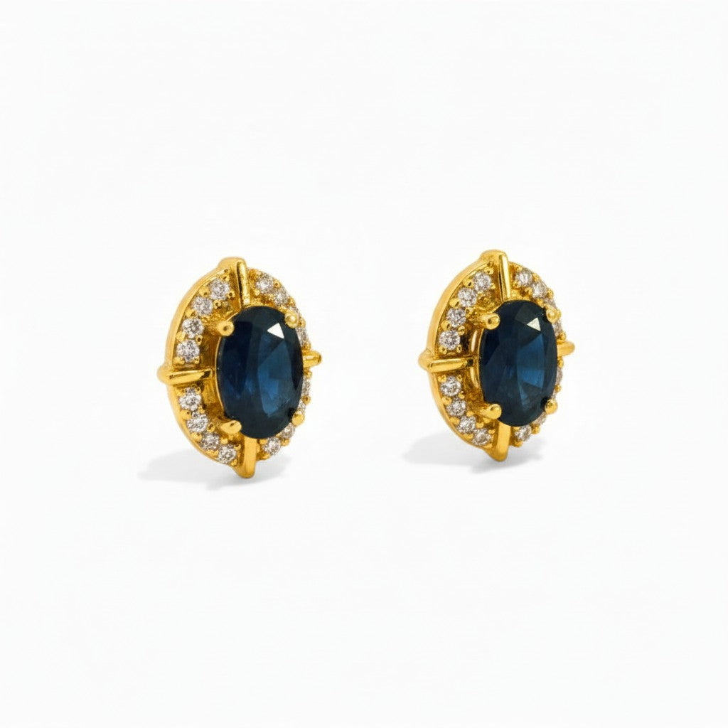 Aros stud Sophia Schneider Joyas de oro 10K con zafiro ovalado y halo de brillantes