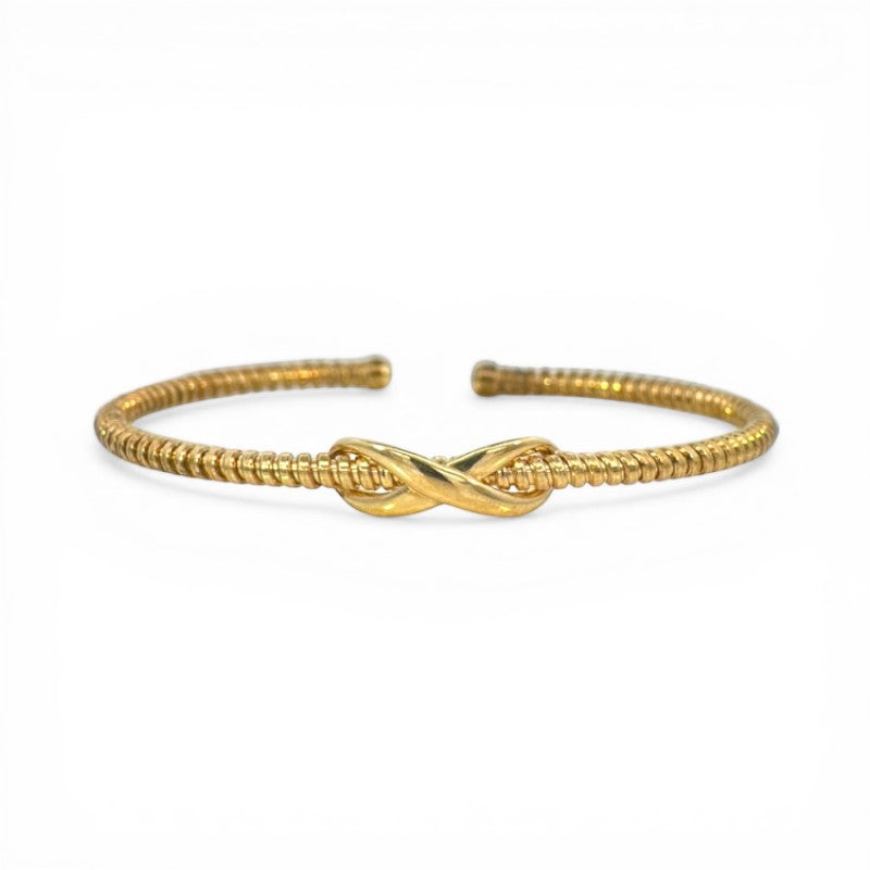 Sophia Schneider Joyas gold-plated sterling silver flexible infinity bangle bracelet, 6x5 cm.