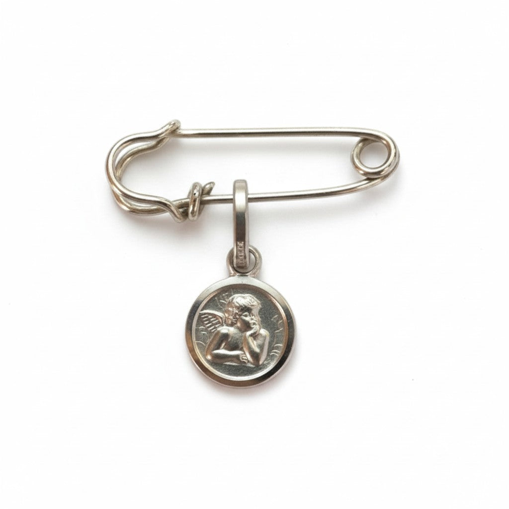 Sophia Schneider Joyas silver safety pin brooch with guardian angel charm. Sterling silver, 3.8cm total length.