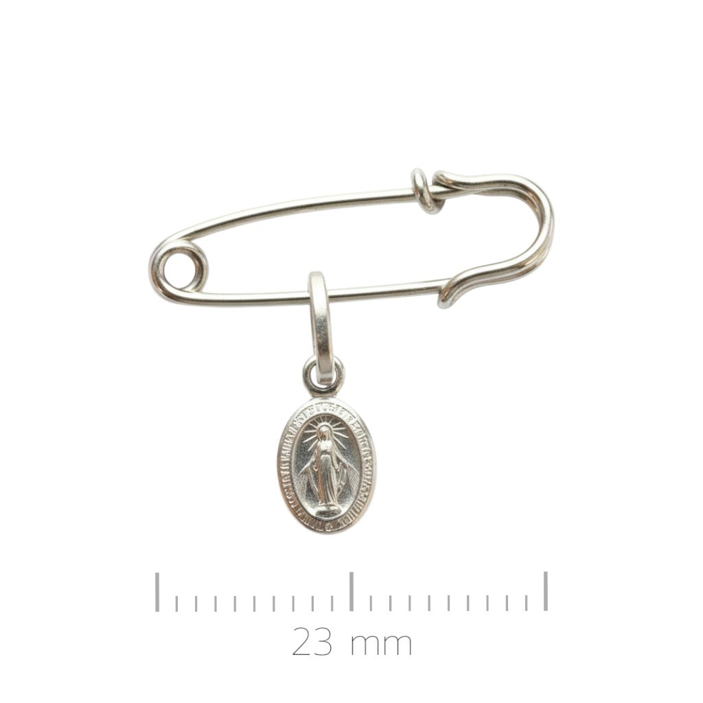 Sophia Schneider Joyas silver safety pin brooch with oval Miraculous Medal charm.