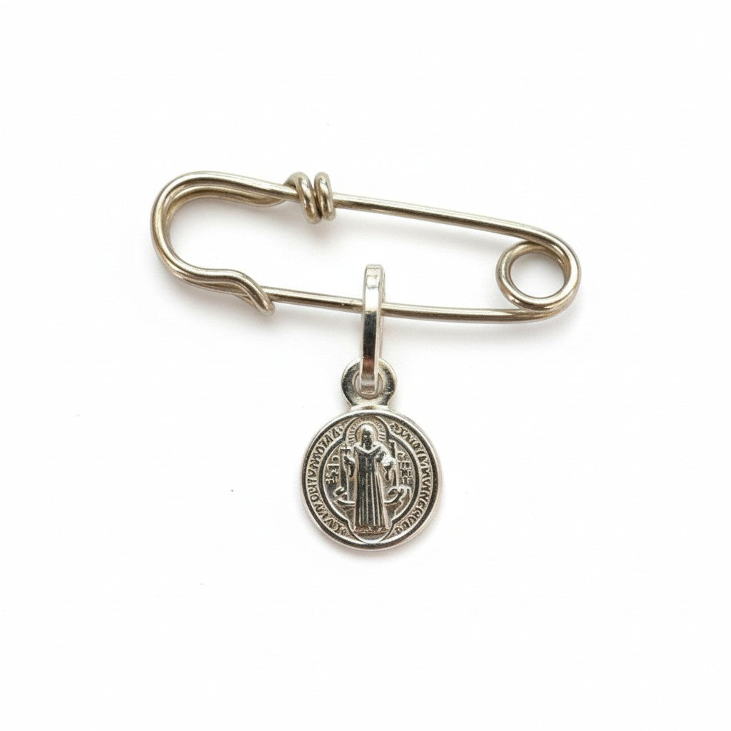 Sophia Schneider Joyas silver safety pin brooch with San Benito medal, 3.8cm long.