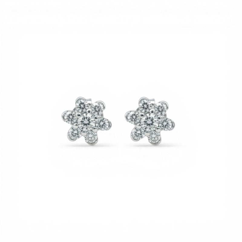 Sophia Schneider Joyas white gold 10K flower stud earrings with 7 brilliant-cut diamonds, 0.25 ct total.
