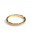 Sophia Schneider Joyas 10K yellow gold band ring with bezel-set diamonds, 0.125 ct total weight.