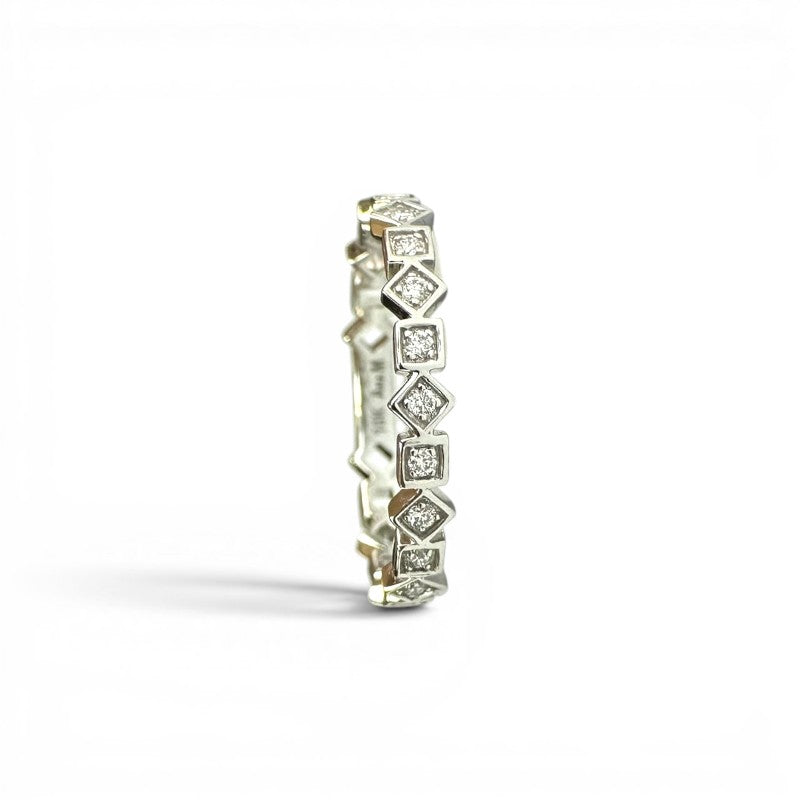 Sophia Schneider Joyas geometric 10K gold band with bezel-set diamonds, 0.10 ct total weight.