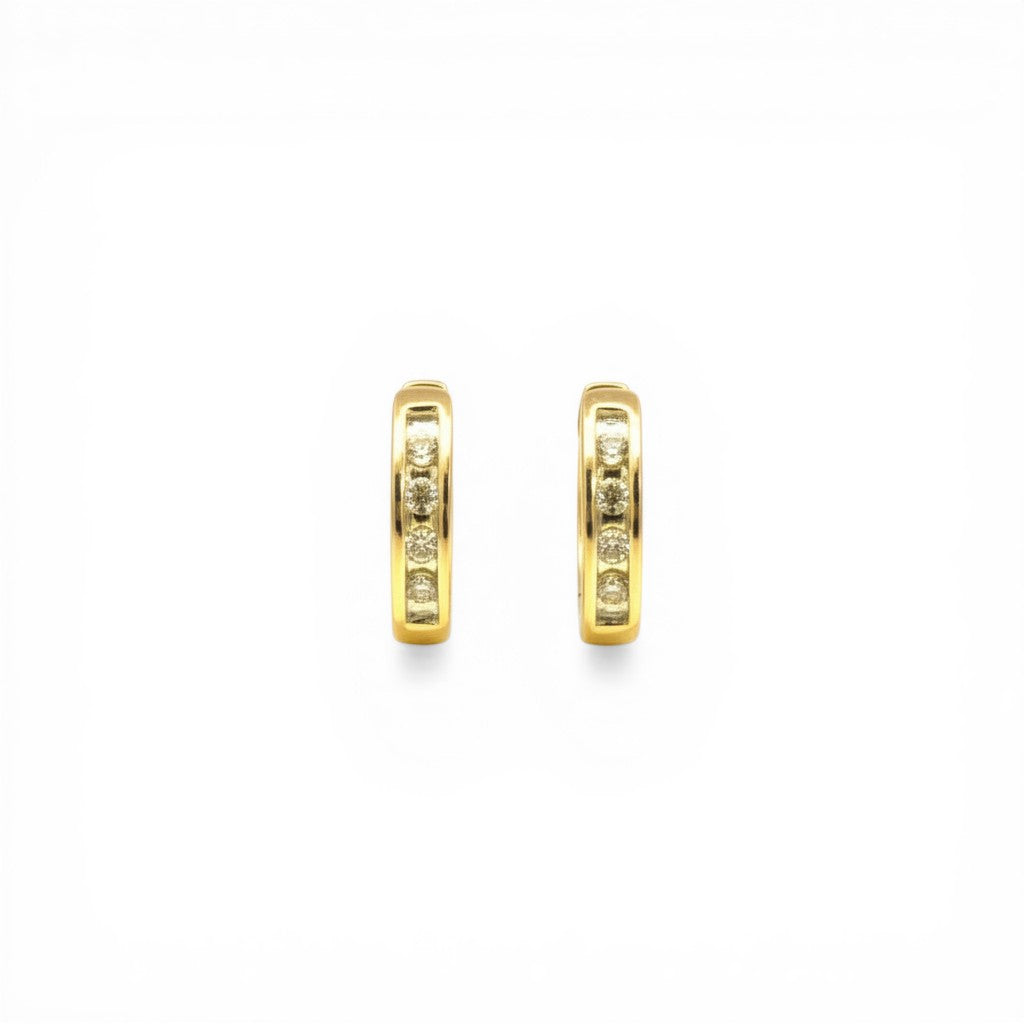 Sophia Schneider Joyas 10K gold hoop earrings with channel-set diamonds, 10mm diameter, 0.05 ct total diamond weight.