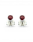 Sophia Schneider Joyas 10K white gold stud earrings with two oval-cut garnets.