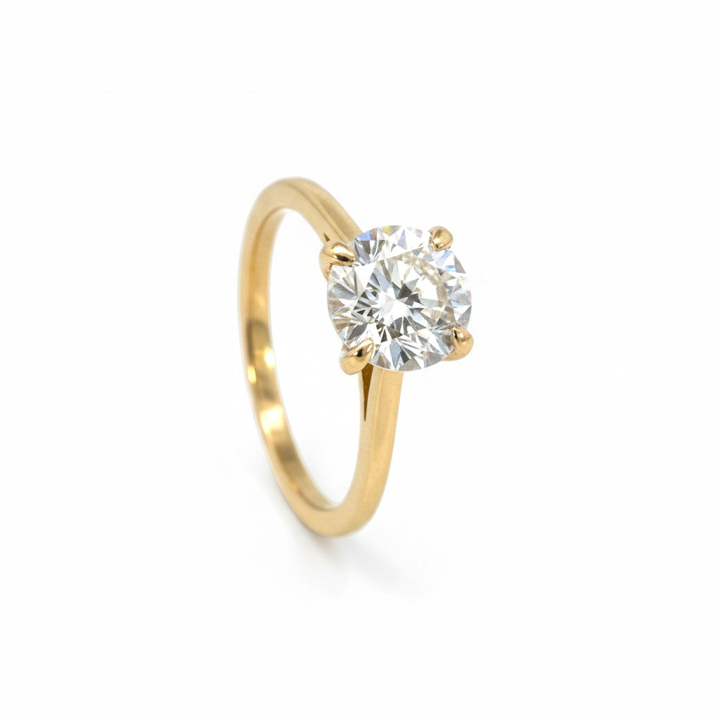 Sophia Schneider Joyas 10K yellow gold solitaire ring with a 2 Ct lab-created diamond.